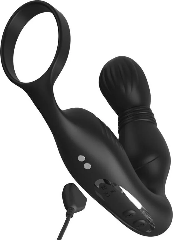 Le masseur avec son câble de charge magnétique